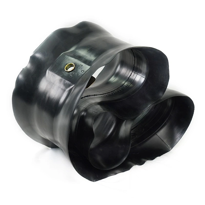 Natural rubber tire flaps for OTR tires